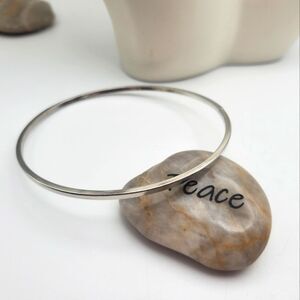 Silver toned bracelet slider‎